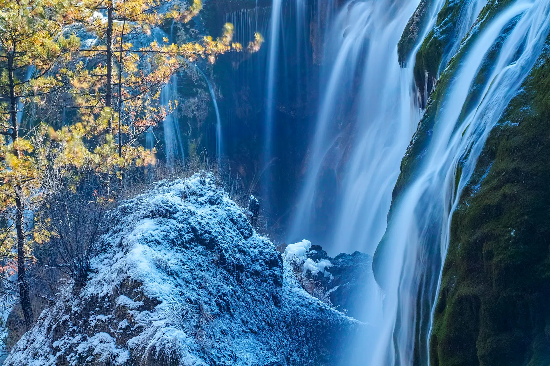 Blue ice frozen waterfall